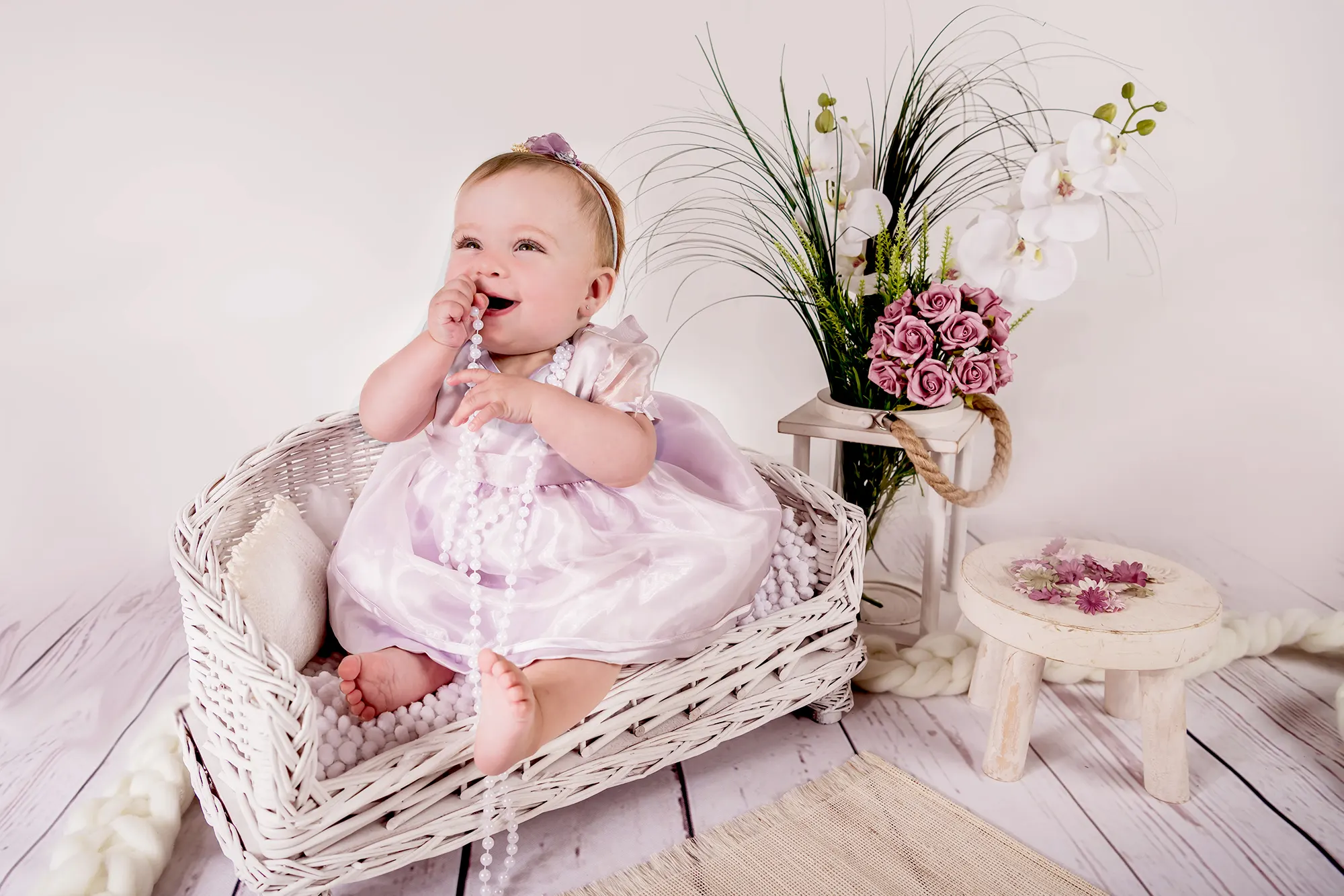 Baby girl with cute bow at Sky Portraits, Sydney - baby photographer