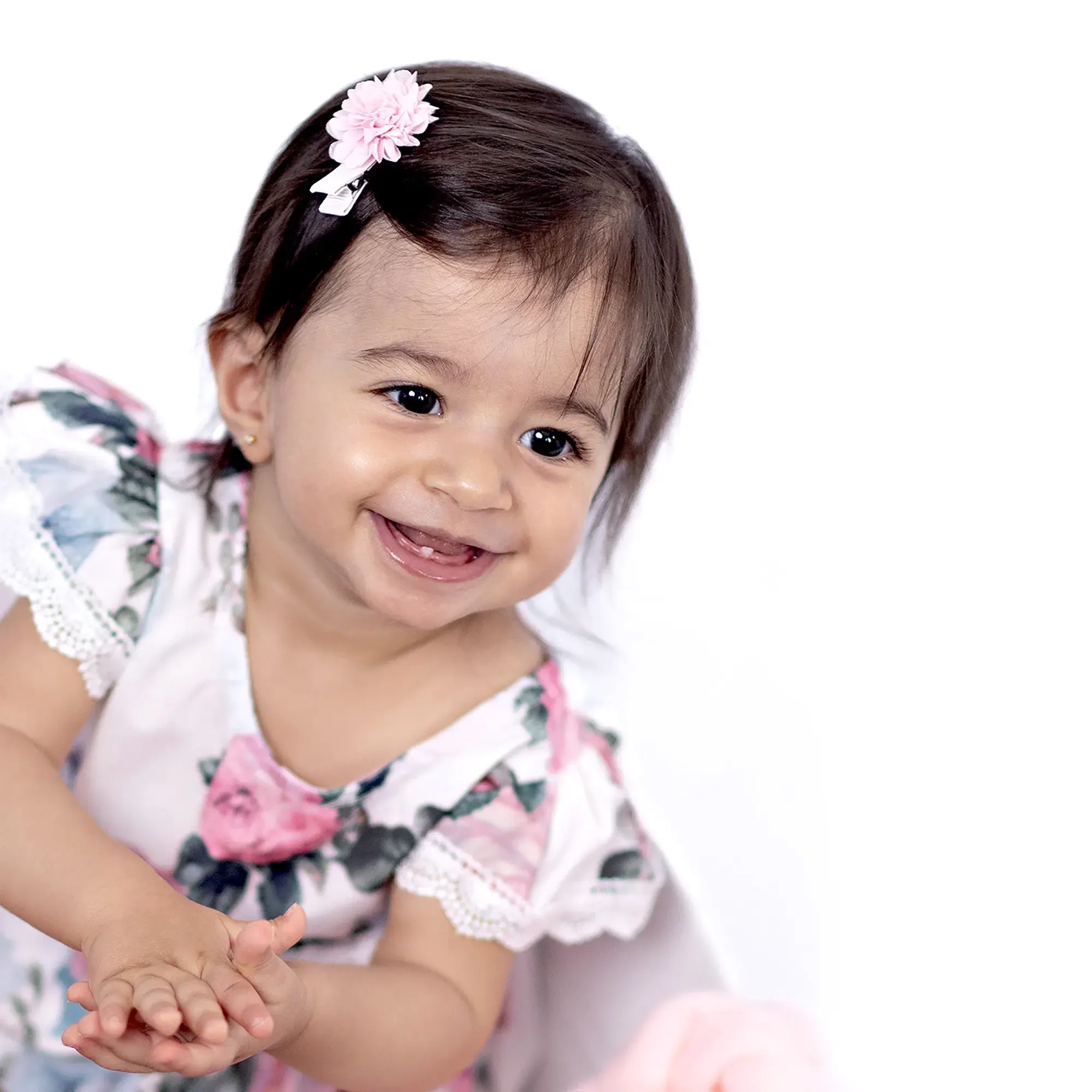 Joyful baby in a vibrant studio setup at Sky Portraits, Sydney - baby photography session