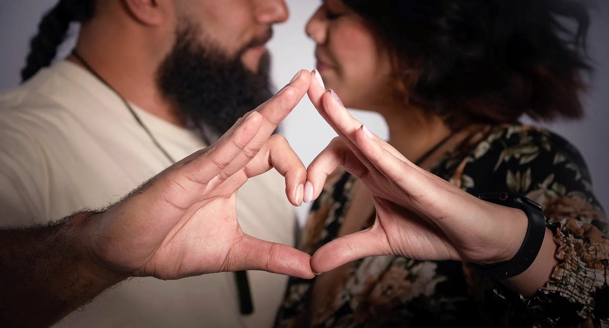 Couple posing with art in North Shore studio, Sydney - artistic couples photographer