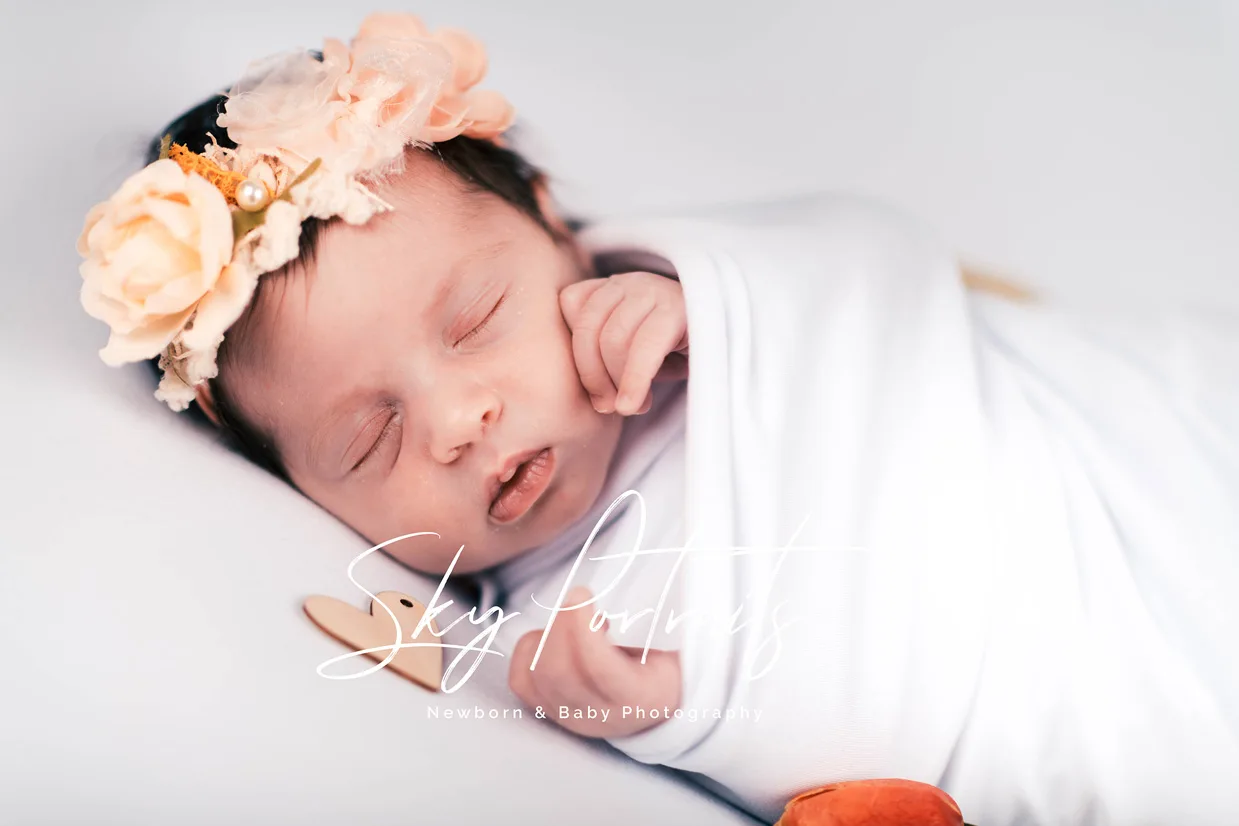 Family and newborn interaction at Sky Portraits, North Shore, Sydney - family photography specialist