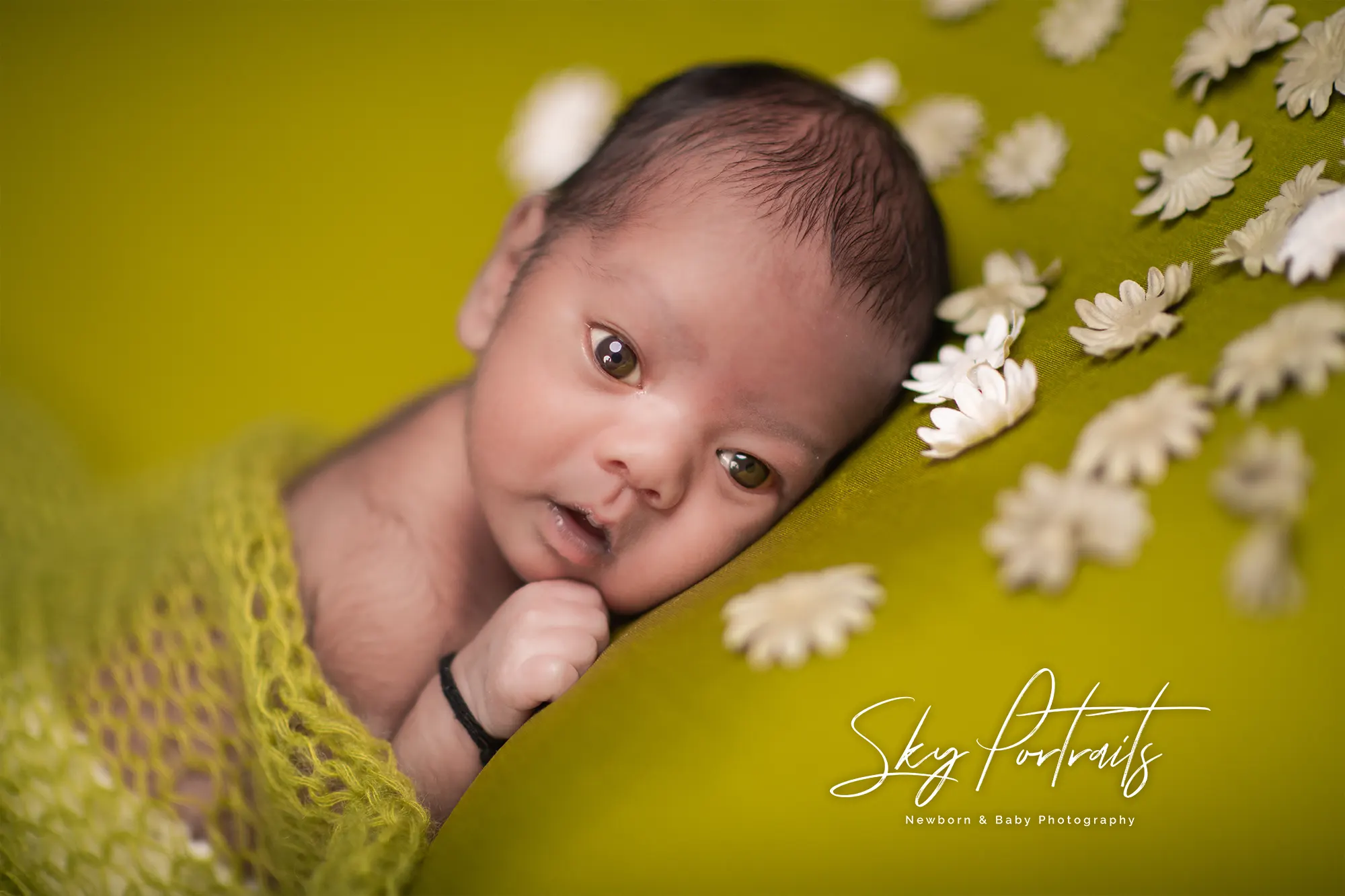 Dreamlike newborn photo with soft pastels at Sky Portraits, St Leonards, Sydney - creative newborn photographer