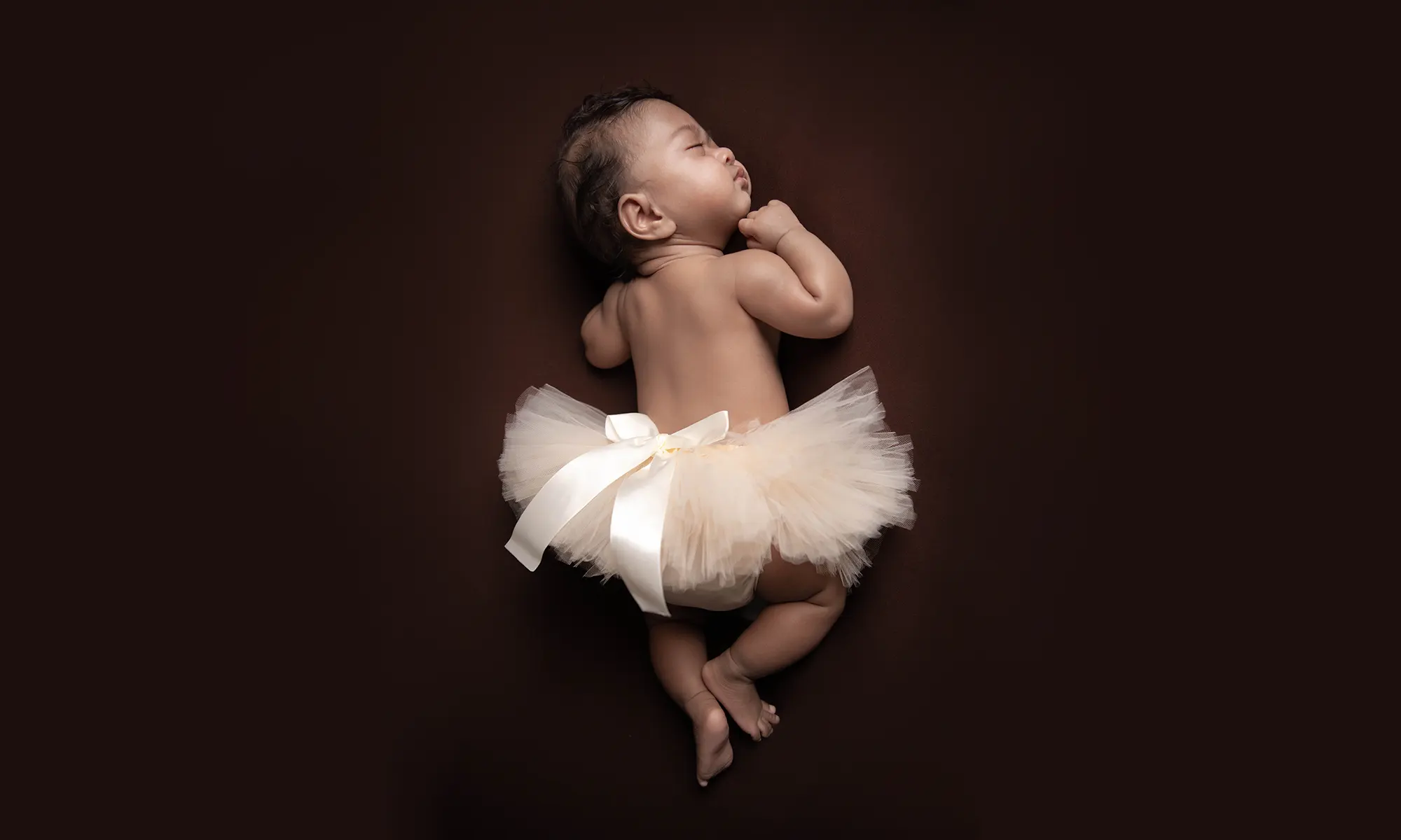 Newborn baby boy swaddled at Sky Portraits Studio, St Leonards, Sydney - baby photography specialist