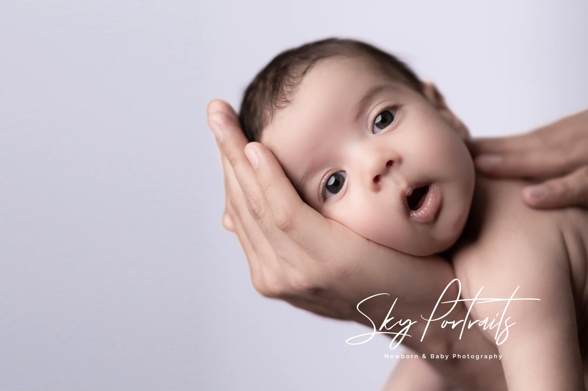 Tender newborn moments in natural light at Sky Portraits Studio, Sydney - natural newborn photography